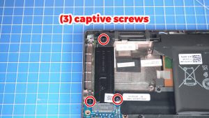 Unscrew and remove the SSD bracket (3 x captive screws).