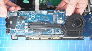 Unscrew and remove the Motherboard (4 x 