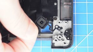 Unscrew and remove the power button (2 x 2mm x 2.5mm).