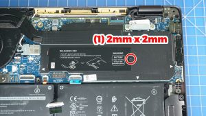 Unscrew and remove the SSD cover (1 x M2 x 2mm).