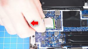 Unscrew and remove the SSD cover (1 x M2 x 3mm).