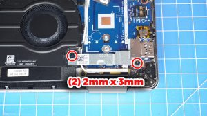 Unscrew and remove the WWAN bracket (2 x M2 x 3mm).