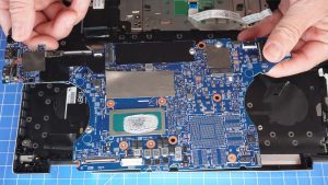 Unscrew and remove the Motherboard (2 x 