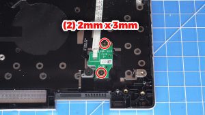 Unscrew and remove the power button board (2 x M2 x 3mm).