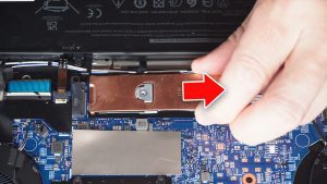 Unscrew the SSD and separate it from the securing bracket (1 x M2 x 2mm).