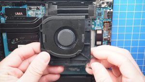 Unscrew and remove the left and right Cooling Fans (4 x 