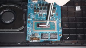 Apply a small amount of new thermal paste to the processors.