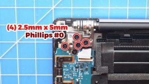 Unscrew and lift the left LCD hinge (4 x M2.5 x 5mm).