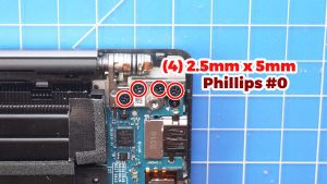 Unscrew and lift the right LCD hinge (4 x M2.5 x 5mm).