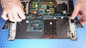 Unscrew and turn over the Motherboard (9 x 