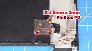 Unscrew and remove the power button bracket (3 x 1.6mm x 2mm).