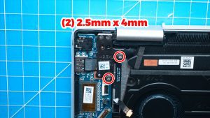 Unscrew and lift up the left LCD hinge (2 x M2.5 x 4mm).