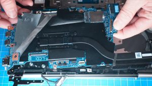 Unscrew and remove the Motherboard (2 x 