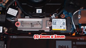 Unscrew and slide out the SSD assembly (1 x M2 x 3mm).