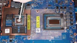 Apply a small amount of new thermal paste to the processors.