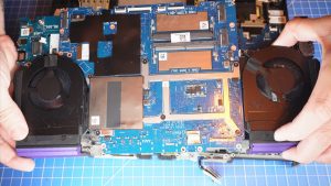 Unscrew the Motherboard, USB Circuit Board, and Ethernet Board and then turn over the Motherboard (7 x 