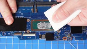 BEFORE REPLACING HEATSINK: Wipe away any old thermal paste from the CPU and heatsink.