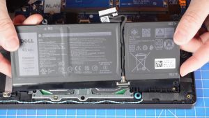 Unscrew and remove the Battery (3-CELL BATTERY: 3 x 