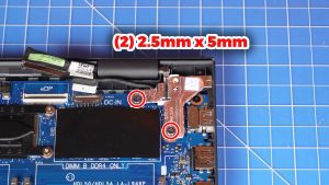 Unscrew and lift the right LCD hinge (2 x M2.5 x 5mm).