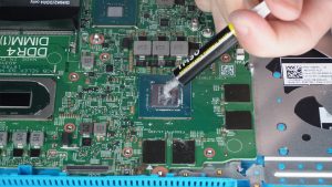 Apply a small amount of new thermal paste to the processors.