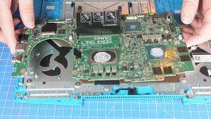 Unscrew and remove the Motherboard (1 x 