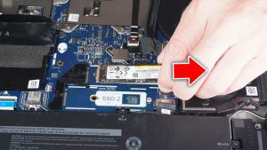 Unscrew and remove the SSD thermal bracket (1 x M2 x 3mm).