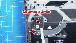 Unscrew and remove the power button bracket (2 x M2 x 2mm wafer).