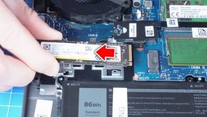 Unscrew and remove the thermal bracket from SSD slot 2 (2 x M2 x 4mm).