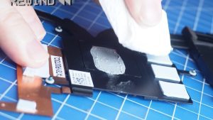 BEFORE REPLACING HEATSINK: Wipe away any old thermal paste from the CPU and heatsink.