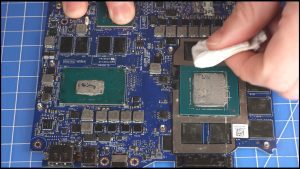 BEFORE REPLACING HEATSINK: Wipe away any old thermal paste from the processors and heatsink.