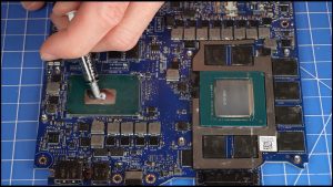 Apply a small amount of new thermal paste to the processors.