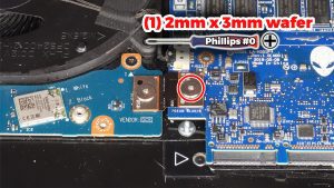 Unscrew and disconnect the I/O board cable that bridges the left I/O circuit board to the motherboard (1 x M2 x 3mm wafer).