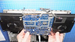 Unscrew and remove the Motherboard and 