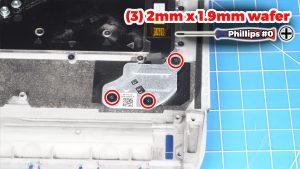 Unscrew and remove the power button bracket (3 X 2mm x 1.9mm).