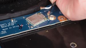 Unscrew and remove the WiFi bracket (1 x M2 x 3mm).