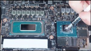 Apply a small amount of new thermal paste to the processors.