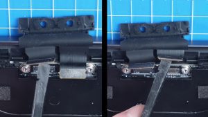 Unscrew and disconnect the LCD bracket and cables (2 X 1.4mm x 1.3mm) (2 x M2 x 3mm).