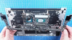 Unscrew and remove the Motherboard (9 X 2mm x 4.5mm).