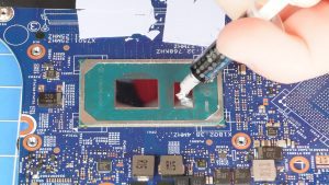 Apply a small amount of new thermal paste to the processors.