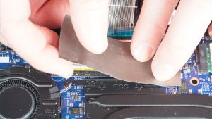 Unscrew and remove the SSD (1 x M2 x 3mm).